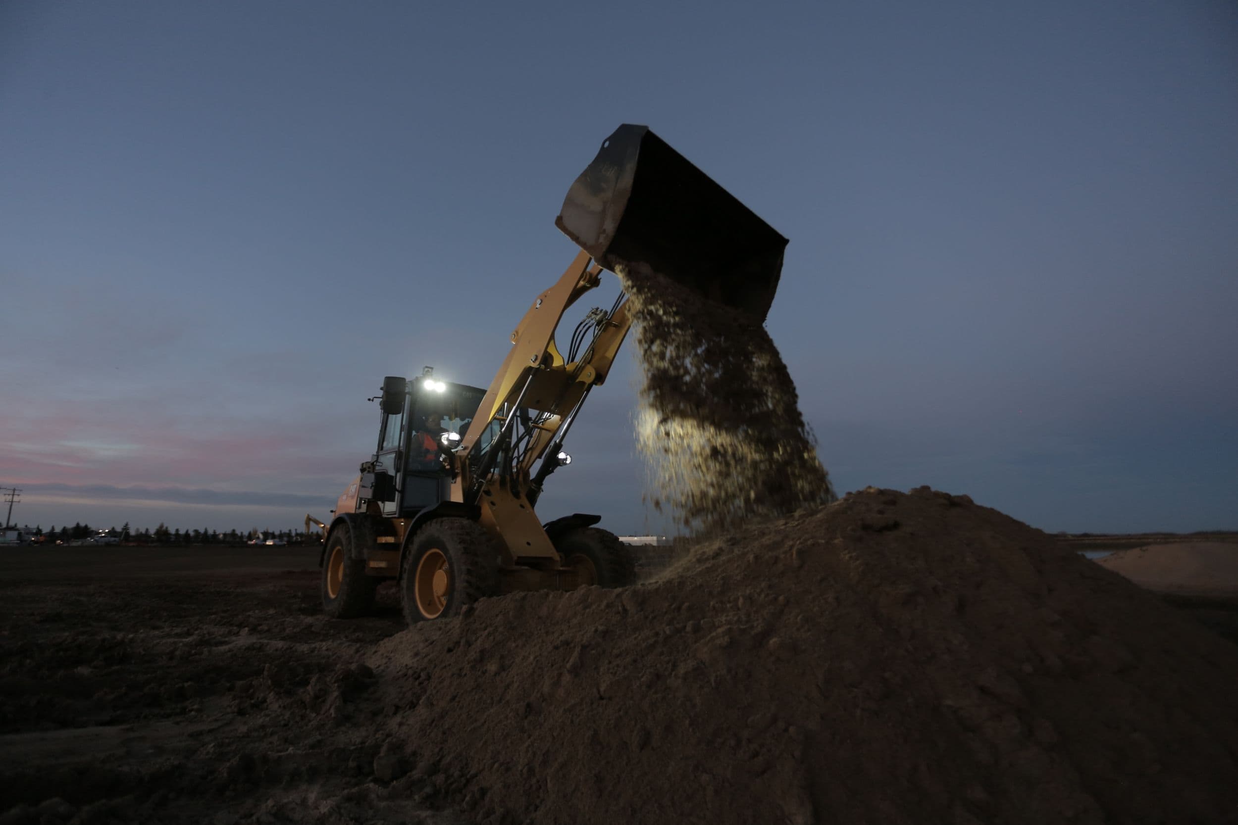 908 Compact Wheel Loader High Lift at Twilight