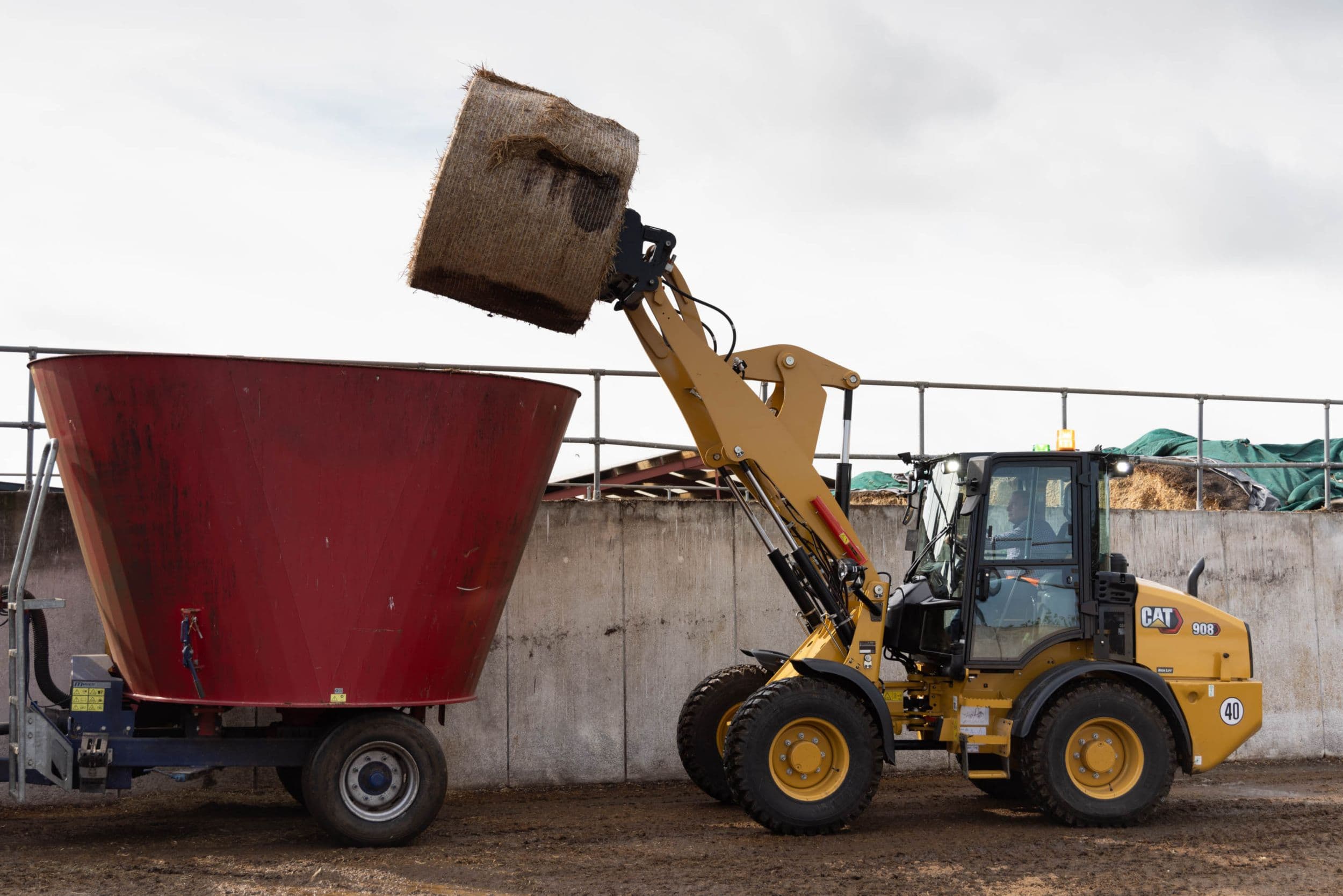 908 Compact Wheel Loader High Lift in Ag Application