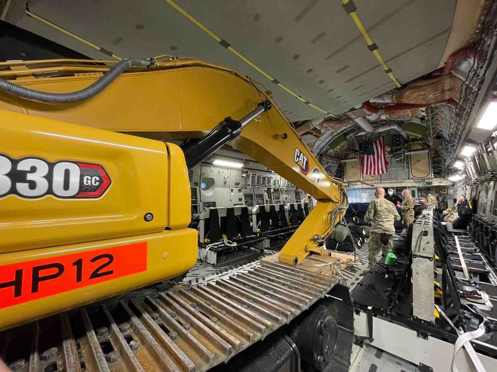 Cat 330 GC excavator onboard plane to Antarctica